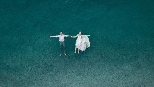 Preview wallpaper couple, water, aerial view, romance, love