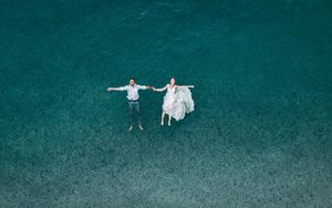 Preview wallpaper couple, water, aerial view, romance, love
