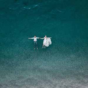 Preview wallpaper couple, water, aerial view, romance, love