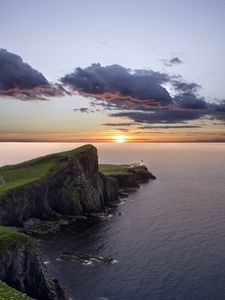 Preview wallpaper crag, sunset, lighthouse, sea, horizon