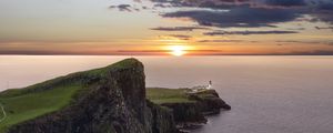 Preview wallpaper crag, sunset, lighthouse, sea, horizon