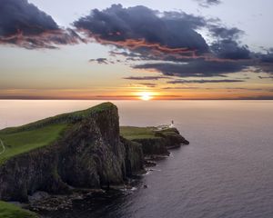 Preview wallpaper crag, sunset, lighthouse, sea, horizon