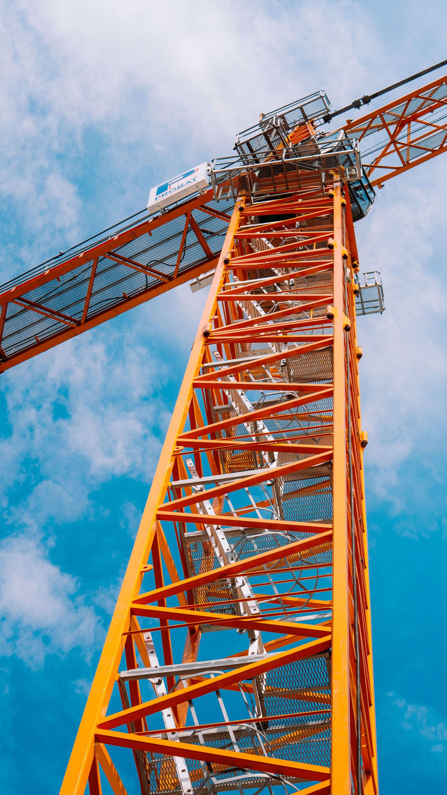 1440x2560 Wallpaper crane, construction, clouds, sky, height