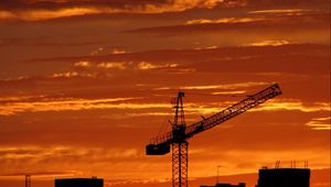 Preview wallpaper crane, sunset, sky