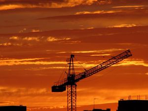 Preview wallpaper crane, sunset, sky