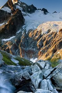 Preview wallpaper creek, mountains, rocks, light