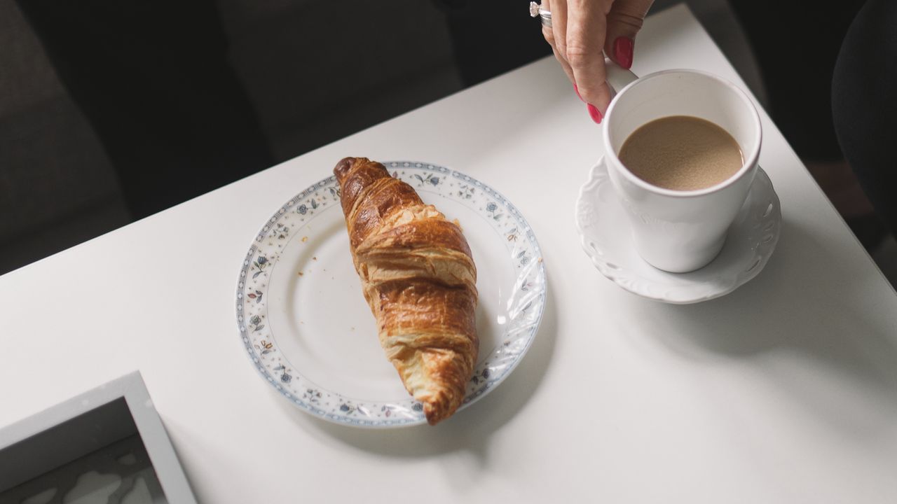 Wallpaper croissant, coffee, dessert, laptop, work, aesthetics