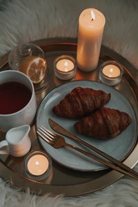 Preview wallpaper croissants, tea, candles, breakfast, dish