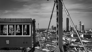 Preview wallpaper crossbar, railway carriage, tower, buildings, city, bw