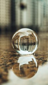 Preview wallpaper crystal ball, ball, buildings, water, reflection