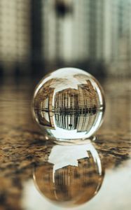 Preview wallpaper crystal ball, ball, buildings, water, reflection