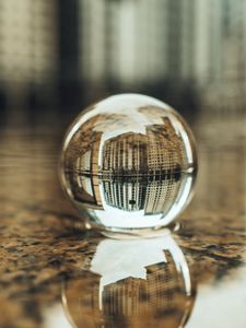 Preview wallpaper crystal ball, ball, buildings, water, reflection