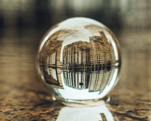 Preview wallpaper crystal ball, ball, buildings, water, reflection