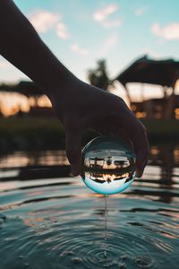 Preview wallpaper crystal ball, ball, hand, water