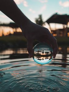 Preview wallpaper crystal ball, ball, hand, water