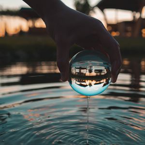 Preview wallpaper crystal ball, ball, hand, water