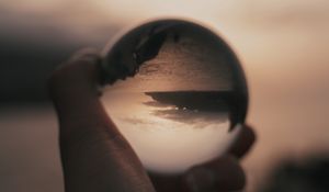 Preview wallpaper crystal ball, ball, hand, reflection, illusion