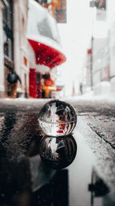 Preview wallpaper crystal ball, ball, puddle, snow, reflection