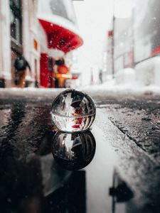 Preview wallpaper crystal ball, ball, puddle, snow, reflection