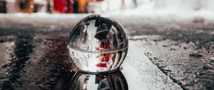 Preview wallpaper crystal ball, ball, puddle, snow, reflection