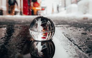 Preview wallpaper crystal ball, ball, puddle, snow, reflection