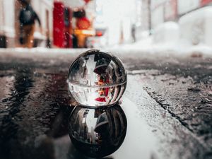 Preview wallpaper crystal ball, ball, puddle, snow, reflection