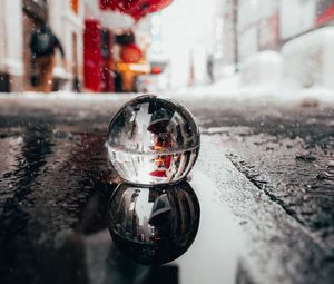 Preview wallpaper crystal ball, ball, puddle, snow, reflection