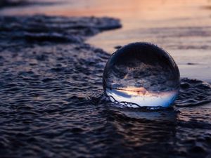 Preview wallpaper crystal ball, ball, reflection, beach, sea, sunset