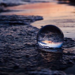 Preview wallpaper crystal ball, ball, reflection, beach, sea, sunset