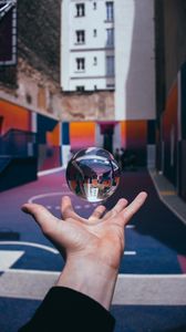 Preview wallpaper crystal ball, ball, sphere, hand, toss