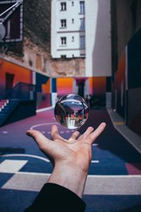 Preview wallpaper crystal ball, ball, sphere, hand, toss