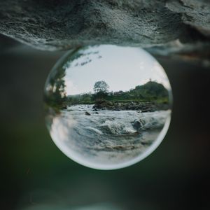 Preview wallpaper crystal ball, ball, sphere, reflection, river
