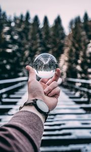 Preview wallpaper crystal ball, ball, sphere, hand, reflection