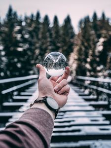 Preview wallpaper crystal ball, ball, sphere, hand, reflection