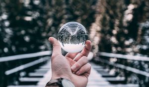 Preview wallpaper crystal ball, ball, sphere, hand, reflection