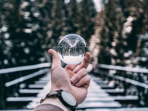 Preview wallpaper crystal ball, ball, sphere, hand, reflection