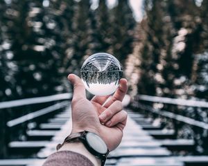 Preview wallpaper crystal ball, ball, sphere, hand, reflection