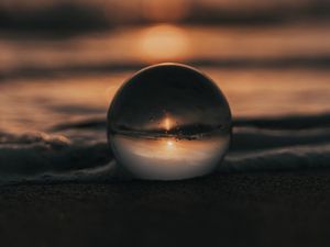 Preview wallpaper crystal ball, ball, sunset, beach, sea