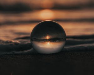 Preview wallpaper crystal ball, ball, sunset, beach, sea