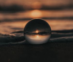 Preview wallpaper crystal ball, ball, sunset, beach, sea