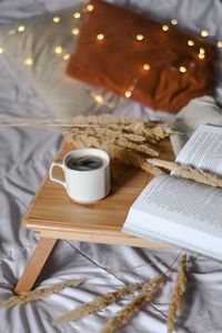 Preview wallpaper cup, book, garland