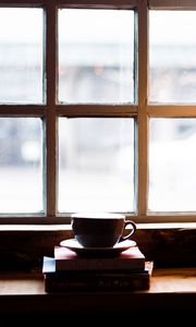 Preview wallpaper cup, books, window, windowsill, light