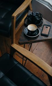Preview wallpaper cup, camera, phone, table