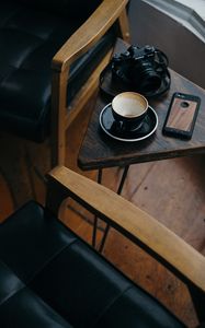 Preview wallpaper cup, camera, phone, table