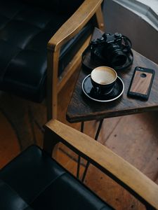 Preview wallpaper cup, camera, phone, table