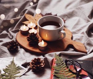 Preview wallpaper cup, candles, cones, coffee, drink, book, comfort