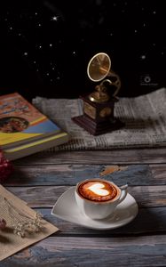 Preview wallpaper cup, cappuccino, coffee, figurine, book