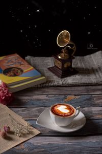 Preview wallpaper cup, cappuccino, coffee, figurine, book