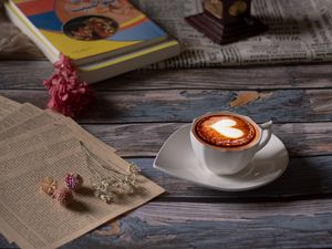 Preview wallpaper cup, cappuccino, coffee, figurine, book