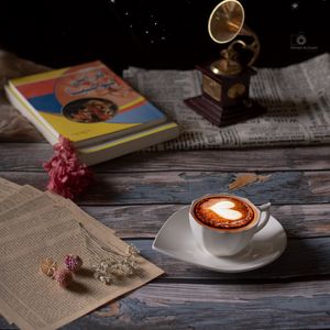 Preview wallpaper cup, cappuccino, coffee, figurine, book